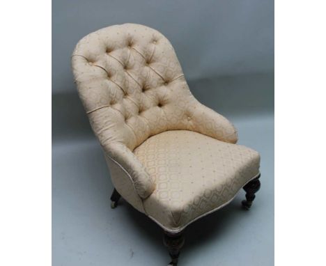 A 19TH CENTURY UPHOLSTERED NURSING CHAIR, with buttermilk, lattice upholstery having button back and overstuffed serpentine f