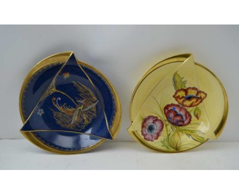 TWO ART DECO CARLTONWARE BOWLS, one powder blue ground with gilded exotic bird decoration, 26cm in diameter, the other same m