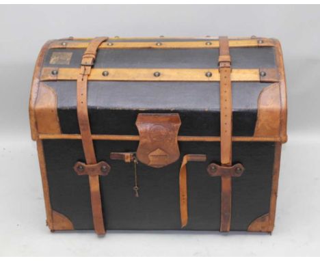A LATE 19TH CENTURY PART WOODEN STAIVED DOME TOP TRAVELLING TRUNK with remains of original leather strapping, 57cm x 78cmCond