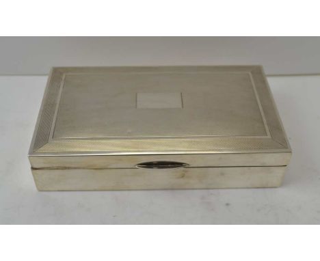 A 20TH CENTURY SILVER CIGARETTE BOX, engine turned hinged cover, cedar lined, Birmingham 1964, 15cm x 9cm 