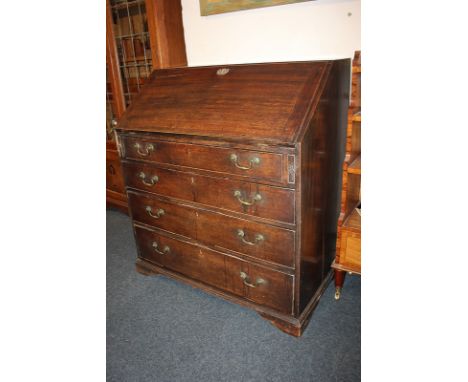 A George III mahogany bureau, with fall enclosing fitted interior, above four graduated drawers, on bracket feet, 95.5cm (a/f
