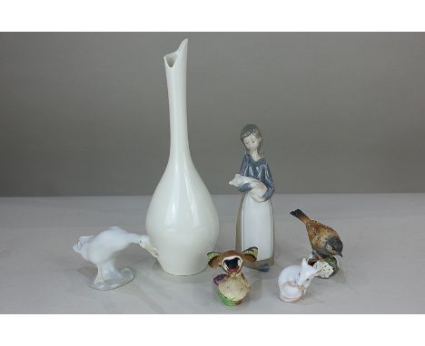 A Royal Worcester plain white porcelain bottle vase, 28cm high; together with a Worcester goldfinch and hedge sparrow, a B & 