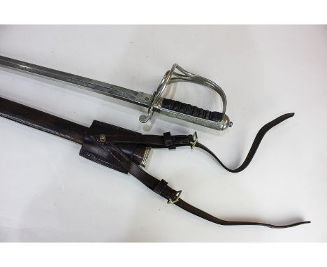 A George V Royal Artillery officer's sword, 87cm etched straight blade, with leather scabbard (a/f)