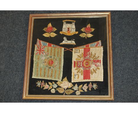 A Victorian military woolwork panel depicting the crossed flags of the Dorsetshire Regiment of Foot beneath their Gibraltar C
