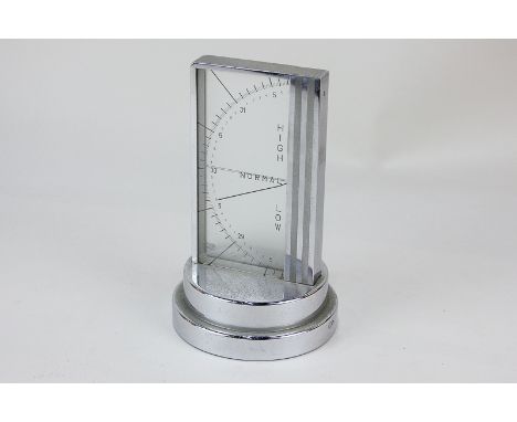 A 1950's Zeiss Ikon chrome cased desk barometer, 16cm high