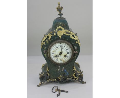 A French style mantel clock, the circular enamel dial with Roman and Arabic numerals, the case with gilt overlay and painted 