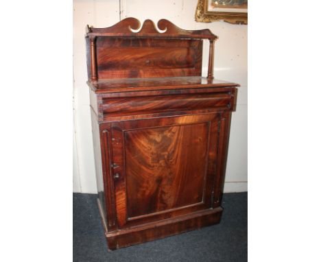 A Victorian mahogany chiffonier with swan neck arched back and shelf above drawers and cupboard, on plinth base (a/f), 72cm