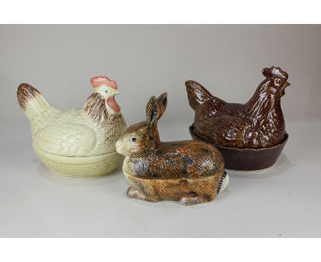 A Caugant pottery rabbit shaped pot and cover, paper label to base, together with two ceramic chicken shaped pots and covers