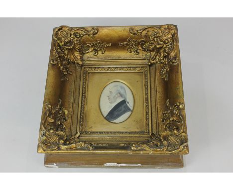 A 19th century oval portrait miniature of a gentleman, in ornate gilt frame, the verso inscribed 'John Bankes Esq of Otley Yo
