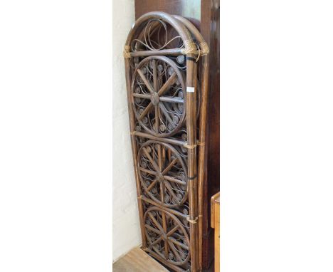 A Victorian mahogany half moon washstand and a bamboo screen
