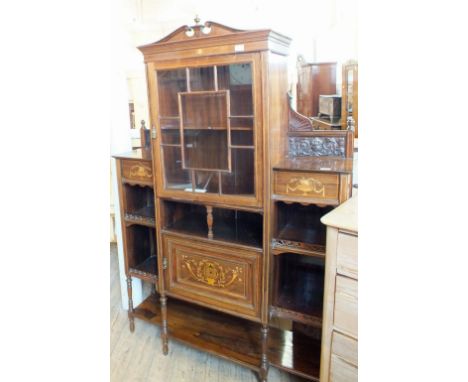 A Victorian rosewood display cabinet with single astral glazed door, carved back frieze and urn and floral inlays with galler