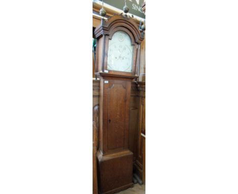 A 19th Century oak eight day longcase clock with painted arch dial, marked Swaffham