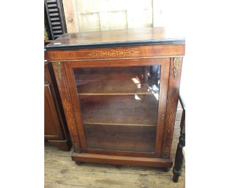 A 19th Century inlaid mahogany and ebonised glazed cabinet with tilt metal mounts