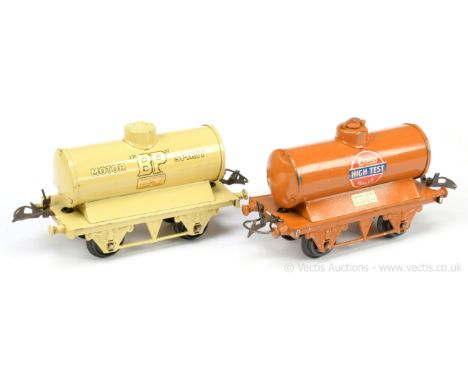 Hornby O Gauge a pair of Petrol Tankers consisting of a cream "BP" large lettered version fitted with post-war plastic wheels