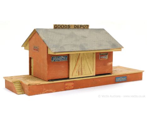 Bassett-Lowke Gauge 1 Goods Depot and includes a number of enamel signs including BDV Cigarettes, Fry's Chocolate, Bournevill