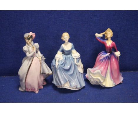 TWO ROYAL DOULTON FIGURINES 'MELISSA' AND 'HILARY' TOGETHER WITH A ROYAL WORCESTER FIGURINE 'MASQUERADE'