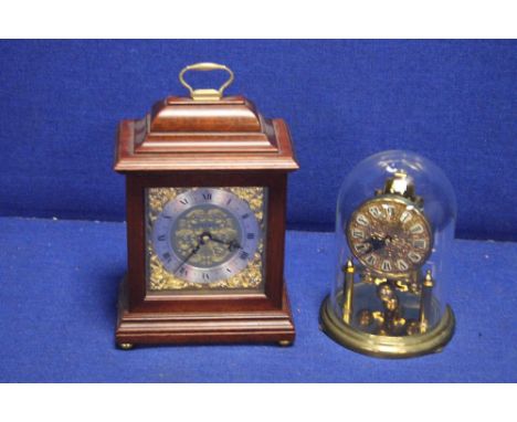 A KUNDO DOME CLOCK TOGETHER WITH A MANTLE CLOCK