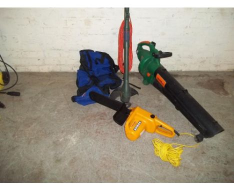 THREE ITEMS TO INCLUDE A CHAINSAW, A STRIMMER AND A LEAF BLOWER
