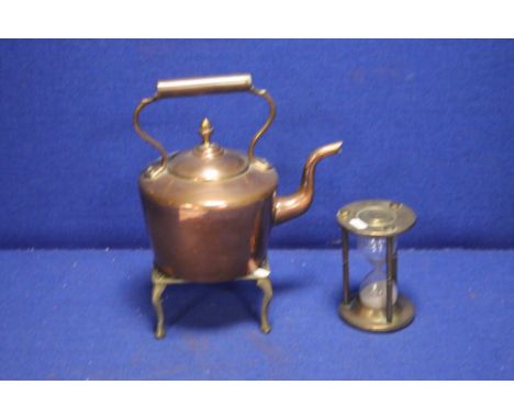 A COPPER KETTLE ON BRASS STAND AND A BRASS EGG TIMER