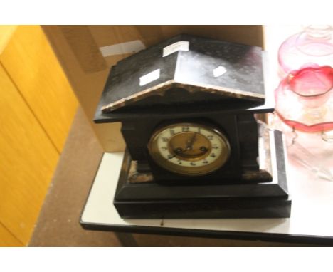 A SLATE MANTLE CLOCK
