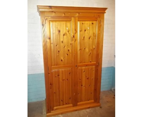 A SOLID PINE 2 DOOR DOUBLE WARDROBE (NO KEY)CONDITION REPORT:This item is locked shut 