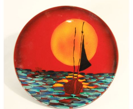 An Anita Harris studio charger in the Poole Pottery manner with sailing boat and sunset detail, 42cm diameter