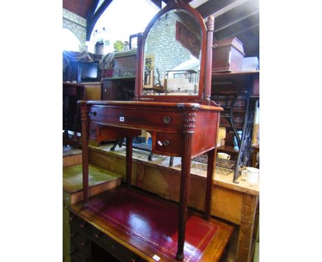 Regency style bow fronted dressing table, the raised back with arched mirror and Corinthian column pillar supports upon a bas