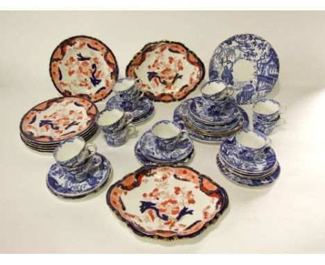 A collection of Royal Crown Derby blue and white printed tea wares with chinoiserie decoration comprising a pair of cake plat