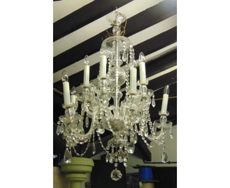 A good large Venetian glass ten branch step chandelier fitted with glass swags and prismatic drops, recently rewired 