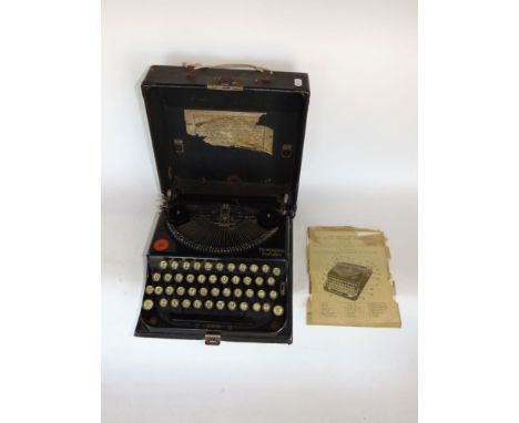 1930s Remington portable typewriter with instruction manual and box