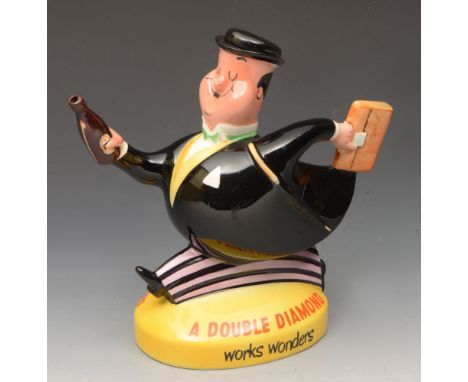 A Beswick Double Diamond advertising decanter and stopper in the form of a running city gent with brief case and beer bottle,