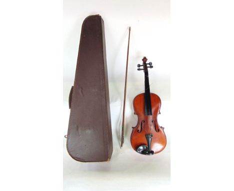 A Stradivarius copy violin with case and bow. 