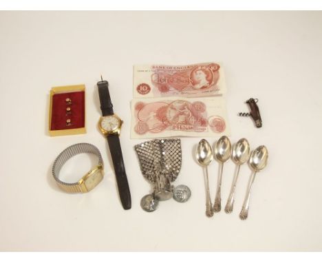 Four silver teaspoons, misers purse, vintage corkscrew in the shape of a bottle, two watches, two 10/ notes (1966 - 70 period