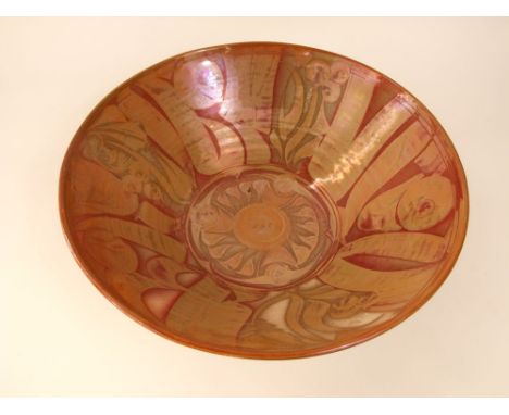 A substantial Studio Pottery open bowl by Alan Caiger Smith with painted lustred sunflower and other stylised organic decorat