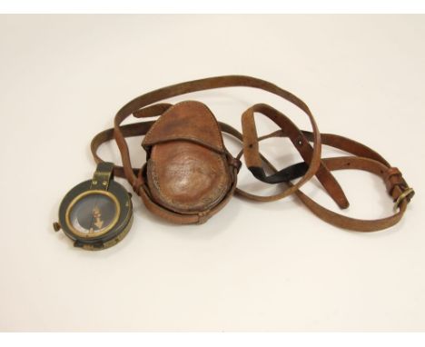 Anglo-Swiss military compass dated 1915, the leather case with shoulder straps dated 1916