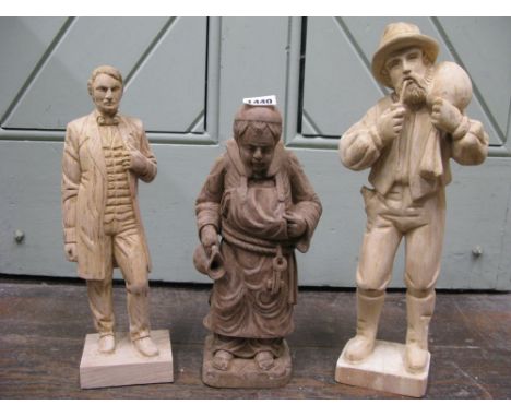 A good quality carved newel post finial in the form of a monk/friar, 30 cm high approx together with two further carved figur