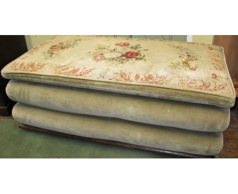 A substantial 19th century box Ottoman with rising lid over a serpentine frame with tapestry top