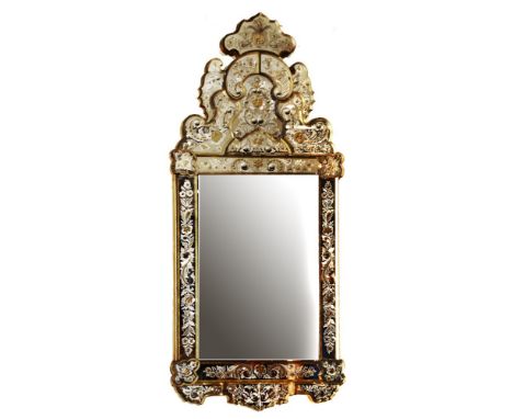 A large Venetian wall mirror the rectangular bevelled edge plate set within a further decorative mirror plate frame, with etc