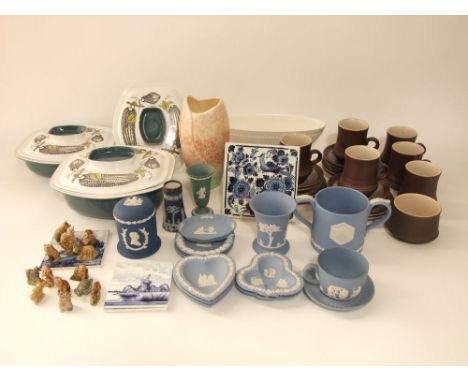 A graduated pair of Poole pottery tureens and covers with marrow detail and a further matching cover, together with a collect