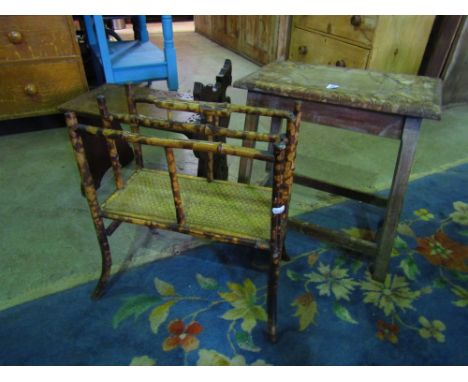 A late Victorian two divisional bamboo Canterbury together with an Old English style oak stool/occasional table with carved t