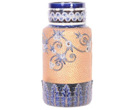 Doulton Lambeth, a stoneware floor standing stick stand, the field with gilt circles and mounted with scrolled floral design,