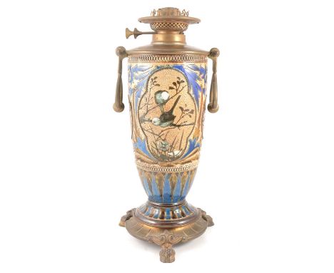 Florence Barlow for Doulton Lambeth, a stoneware oil lamp base, with panels of pate-sur-pate garden birds, incised borders, w