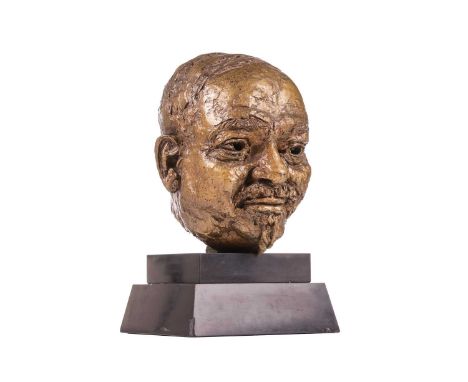 gold patina bronze, 26 cm high, on a slate base, total height 34 cmProvenance  The Estate of Doctor and Mrs Phyllis White-Phi