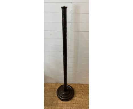 A Chinese carved lamp stand depicting sail and dignities (H158cm Dia36cm) 