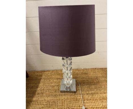 A contemporary chrome and faux crystal lamp