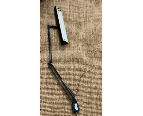 An angle poise light with two strip builds and clamp 