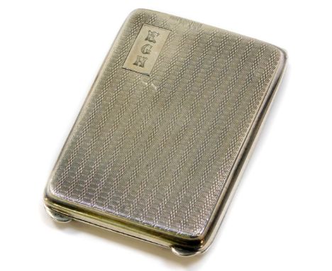 A George V silver match sleeve holder, with engine turned decoration, rectangular reserve, monogram engraved, Birmingham 1927