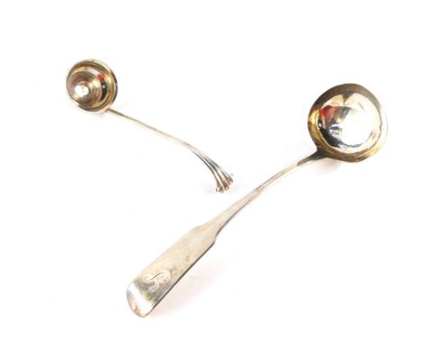 A George III Scottish silver cream ladle, initial engraved, John Zeigler, Edinburgh, 1815., and a George V silver cream ladle