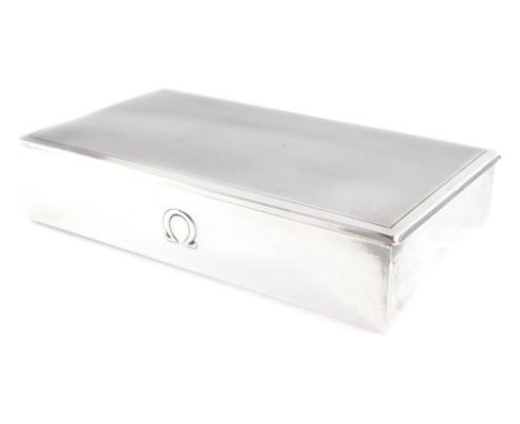 An Omega silver cigarette box, with engine turned decoration, stamped Tezler, 925, 3cm high, 15.5cm wide, 8.5cm deep, 8.37oz 