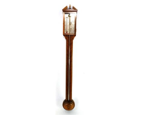 A mahogany and line inlaid stick barometer by Comitti of Holborn, with thermometer and vernier scale, the case of architectur